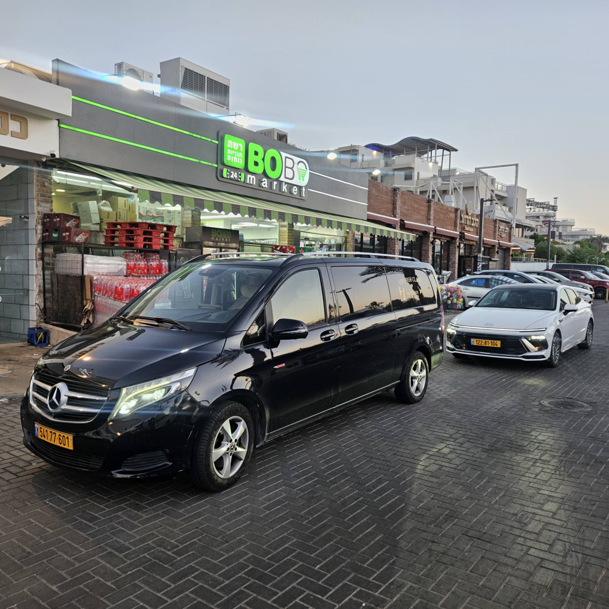 Luxury car night skyline
